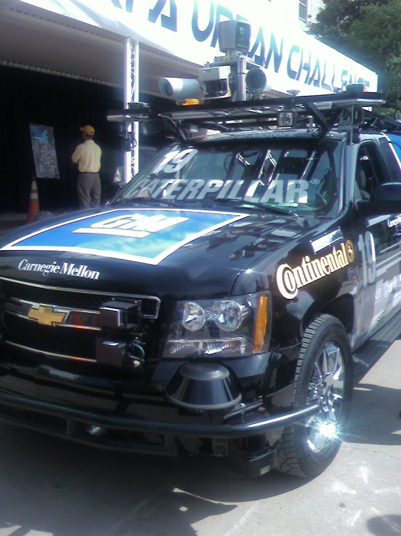 Illustration for article titled DARPA Urban Challenge Cars Invading Pentagon Parking Lot